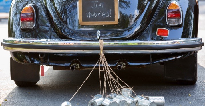 just married sign on back of car