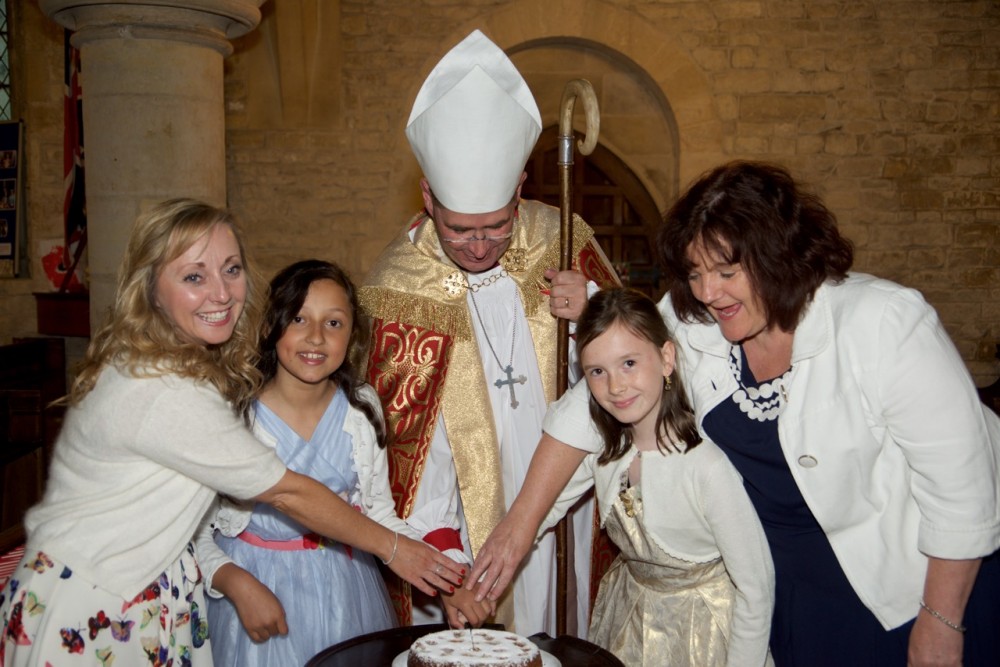 Confirmation candidates cutting cake
